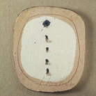 Lucio Fontana, Concetto spaziale,  1950, buchi e graffito su terracotta, cm 33x27,5