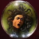 Caravaggio, Scudo con testa di Medusa, 1595-1598, Olio su tela, 60 × 55 cm, Firenze, Galleria degli Uffizi