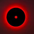 Nanda Vigo, Genesis Light, 2006, cristallo nero e neon rosso, diam. esterno cm 85, interno cm 11 - Courtesy: MAAB Gallery, Milano-Padova