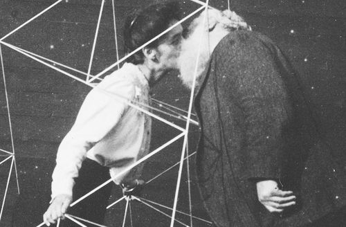 Alexander Graham Bell kissing his wife Mabel Hubbard Gardiner Bell, who is standing in a tetrahedral kite, Baddeck, Nova Scotia. Credit Prints and Photographs Division Washington, Library of Congress, LC-DIG-ds-06863