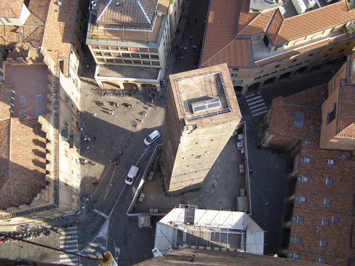 Garisenda tower seen from the top of the Asinelli tower in Bologna | Photo: Route66