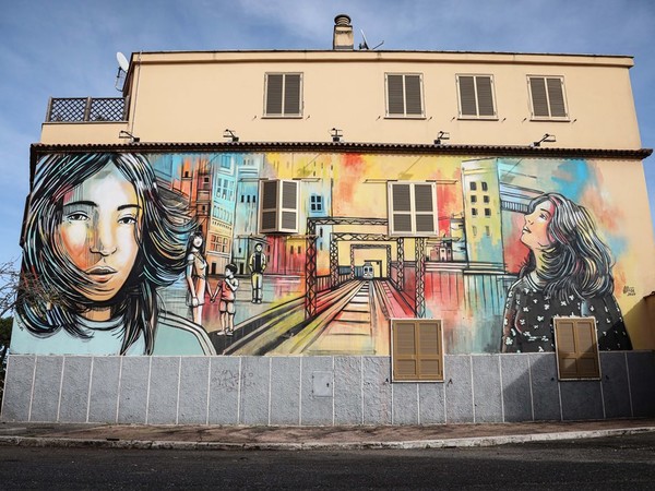 Murales di Alice Pasquini per il progetto One City, Casal Bertone, Roma