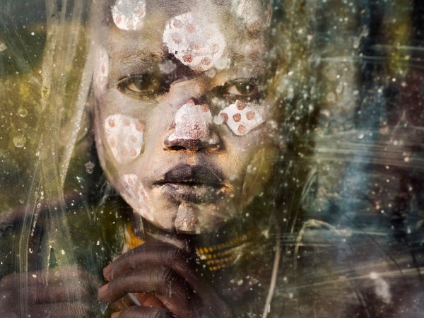 Steve McCurry, Ritratto di un ragazzo della tribù Suri, Omo Valley, Ethiopia, 2013