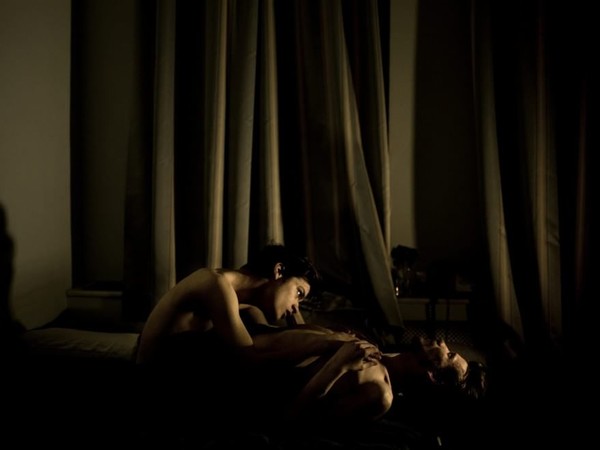 World Press Photo of the Year 2014: Jon, 21, and Alex, 25, a gay couple, during an intimate moment. Life for lesbian, gay, bisexual or transgender (LGBT) people is becoming increasingly difficult in Russia. Ph. Mads Nissen