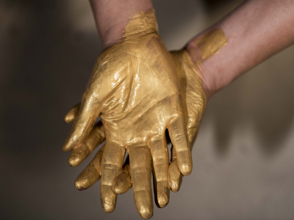 Maria Veronica Leon Veintemilla, <em>Gold Hand Reading</em>, 2015, Photography, 110 x 170 cm. Courtesy of Artist Collection, made for 56th Biennale di Venezia