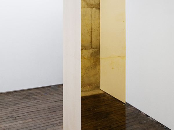 Lara Favaretto, Homage to Thomas Grant Hadwin ,2011. Earth, wood and brass, containing secret objects sealed in an iron box, cm 300x70x70. Installation view at ‘Klosterfelde visit Sutten Lane’, Paris, 2011. Private Collection