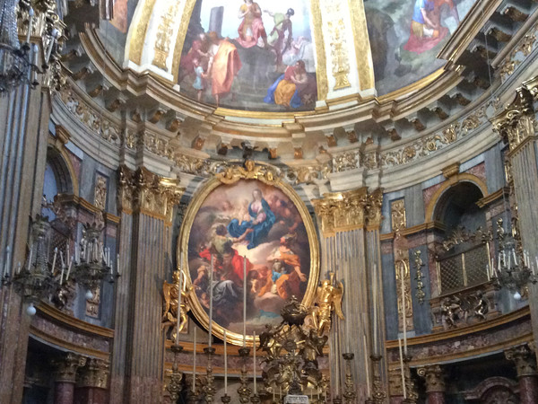 Altar piece featuring Madonna and patron saints