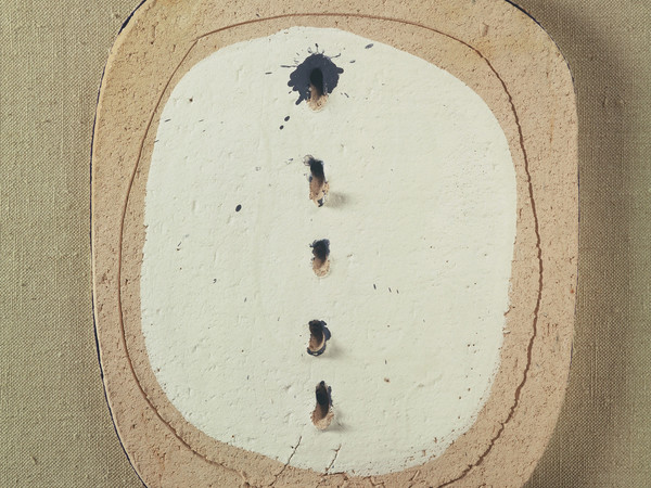 Lucio Fontana, Concetto spaziale,  1950, buchi e graffito su terracotta, cm 33x27,5