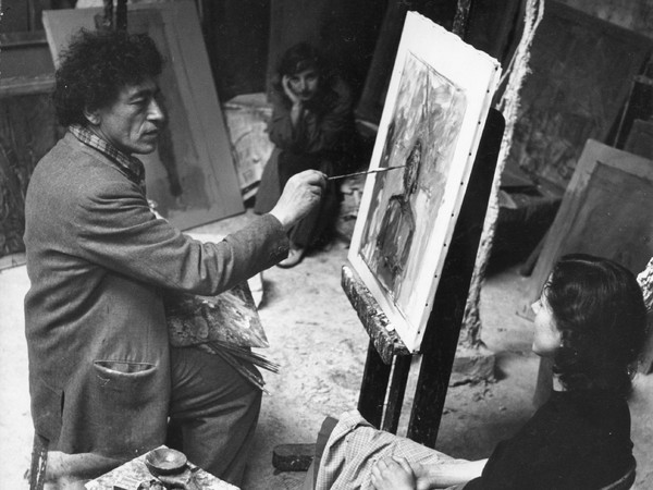 Alberto Giacometti painting Annette’s portrait in the studio, 1951, Photograph by Ernst Scheidegger  | © Ernest Scheidegger © Alberto Giacometti Estate / Licensed in the UK by ACS and DACS, 2016 Courtesy of Gagosian Gallery Grosvenor Hill, London