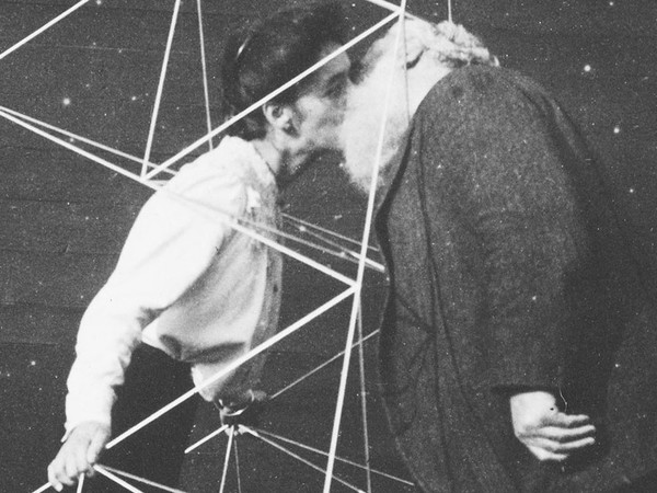 Alexander Graham Bell kissing his wife Mabel Hubbard Gardiner Bell, who is standing in a tetrahedral kite, Baddeck, Nova Scotia. Credit Prints and Photographs Division Washington, Library of Congress, LC-DIG-ds-06863