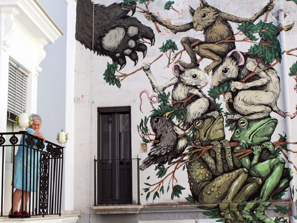 Murale di Ericailcane su un palazzo di Grottaglie