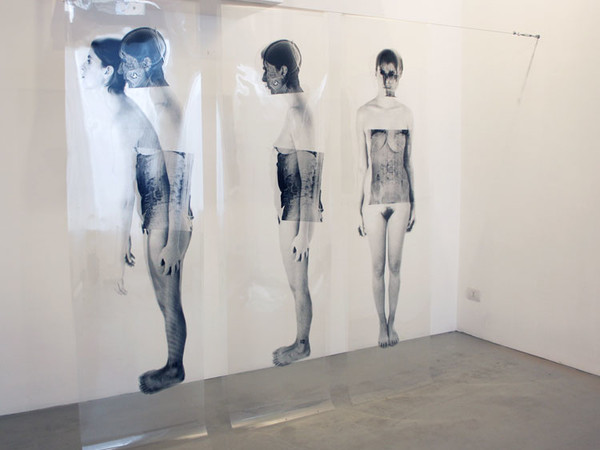 Giancarlo Marcali, Doppelgänger, avanzamento, 2012, Installazione, foto incisione su pellicola Agfa, cm 200x200x20