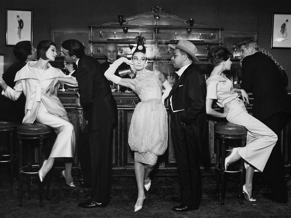 Audrey Hepburn and Art Buchwald, with Simone D'Aillencourt, Frederick Eberstadt, Barbara Mullen, and Dr. Reginald Kerman, evening dresses by Balmain, Dior, and Patou, Maxim's, Paris, August 1959, 1959, gelatin silver print, 50.8 x 61 cm