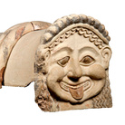 Gorgon Antefix, Terracotta roof ornament with head of a gorgon, Gela, Sicily, c. 500 BC | Courtesy of Museo Archeologico Regionale Di Agrigento © Regione Siciliana
