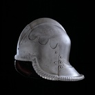 Manifattura lombarda, Celata all’italiana, fine del XV secolo, Ferro fucinata con decorazioni dorate a scaglie di pesce, h. 27 cm, Brescia, Musei Civici d’Arte e Storia-Museo delle Armi “Luigi Marzoli”