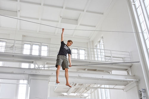 Elmgreen & Dragset, What’s Left?, 2021. Silicone, clothing, wire rope, balancing pole. Dimensions variable I Ph. Elmar Vestner