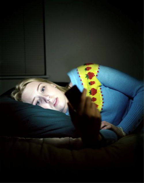 Evan Baden, Katie with LG Chocolate, 2007, 30" x 40", Chromogenic Print mounted to Plexiglass, Courtesy the artist
