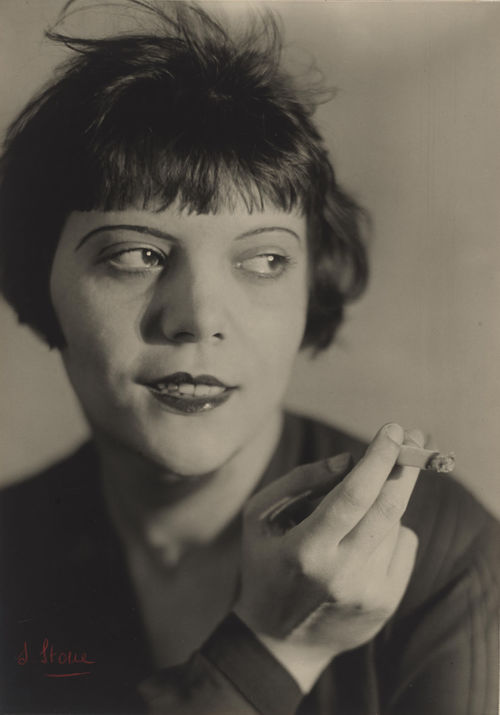 Atelier Stone (Cami Stone and Sasha Stone), Woman Smoking, 1928 Gelatin silver print, 58.6 x 41.4 cm The Museum of Modern Art, New York Thomas Walther Collection. Committee on Photography Fund Digital Image © 2021 The Museum of Modern Art, New York