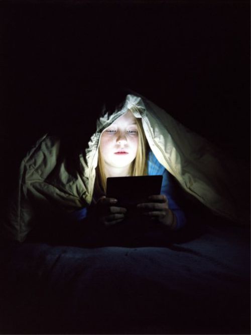 Evan Baden, Lila with Nintendo DS, 2007, C-Print on Plexiglass 76 x 102 cm, Courtesy the artist