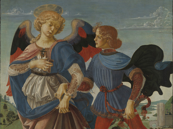 Bottega di Andrea del Verrocchio, Tobia e l'Angelo, 1470-1475 circa, Tempera su legno, 83.6 x 66 cm | © The National Gallery, London | Celebre rappresentazione dell'Arcangelo Raffaele e del suo leggendario aiuto a Tobia in viaggio, che come dal racconto biblico trasporta il pesce che l'Angelo gli ha fatto catturare nel Tigri salvandolo dal morso che l'animale stava per dargli e con la bile del quale il ragazzo guarirà il padre dalla cecità.