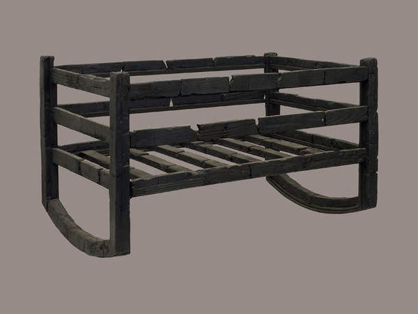 Culla in legno carbonizzata,, Ercolano, 1 secolo dC.  © Soprintendenza Speciale per i Beni Archeologici di Napoli e Pompei