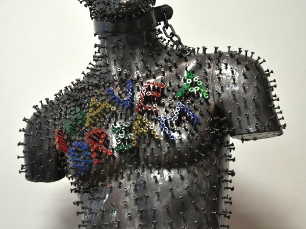Angelo Cortese, Millecinquecento viti per una vita, 2014, poliuretano, viti, metalloidi e resina, cm 85x65x28