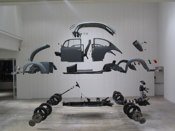 Damián Ortega, Cosmic Thing, 2002. Beetle 83', stainless steel, wires and plexiglass Variable dimensions. Courtesy The Museum of Contemporary Art, Los Angeles, purchased with funds provided by Eugenio López and the Jumex Fund for Contemporary Latin America Art