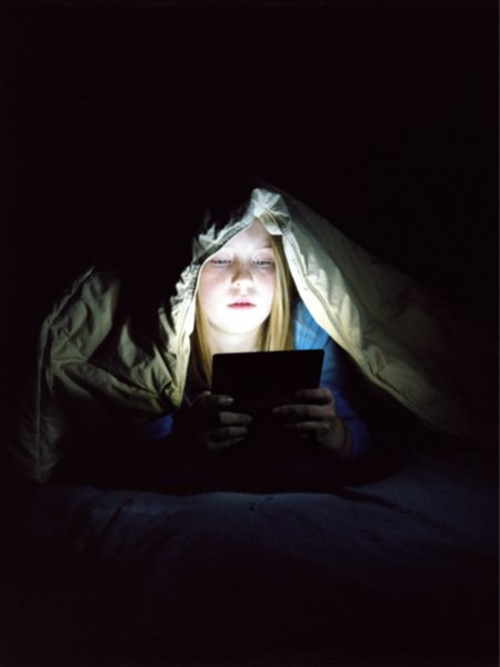 Evan Baden, Lila with Nintendo DS, 2007, C-Print on Plexiglass 76 x 102 cm, Courtesy the artist